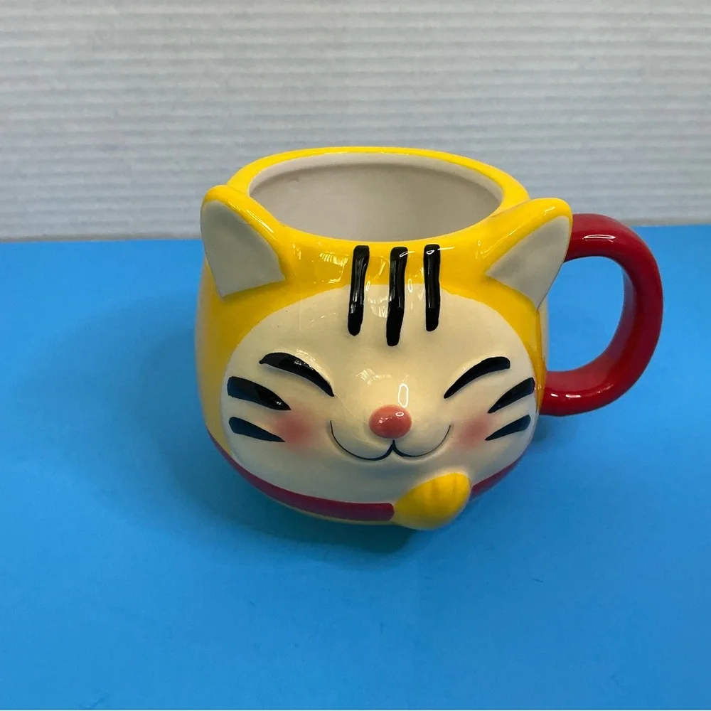 Playful Yellow Cat Face Ceramic Mug with Red Handle